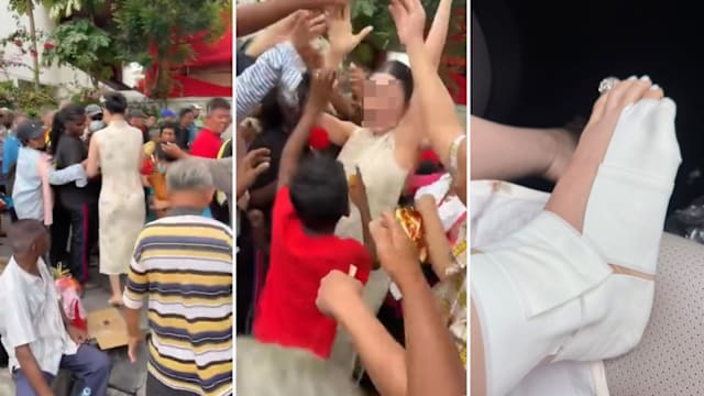 新春行善变混乱 槟城女子派红包引推挤受伤
