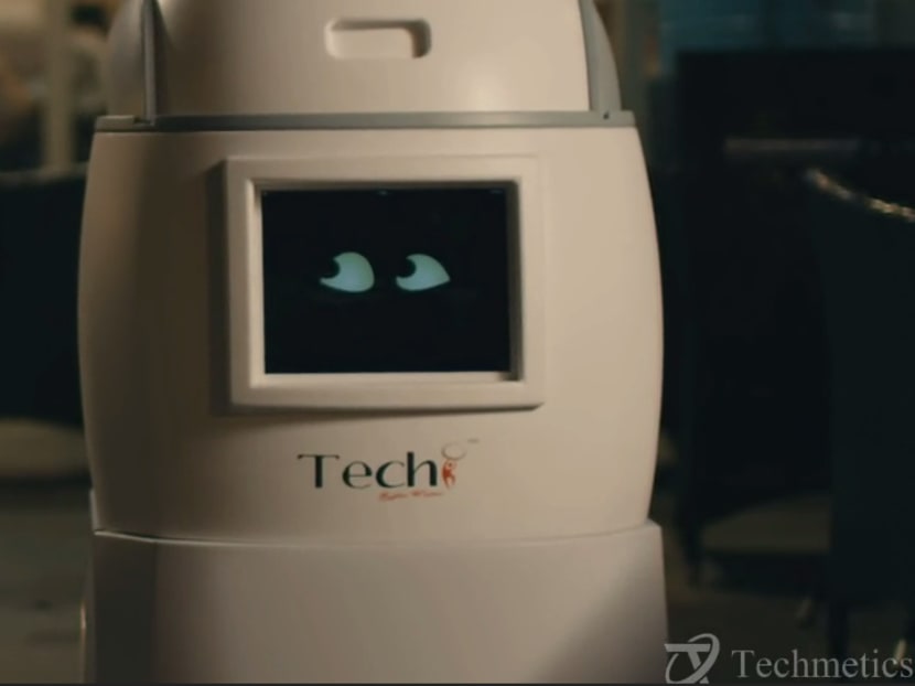 Techi, the service robot, can collect food from the chef and deliver food to patrons in a restaurant. Robots are being deployed in service industries because manpower-intensive industries such as food and beverage (F&B) and hospitality are finding it hard to employ enough Singaporeans to take on the jobs. Photo: Techmetics