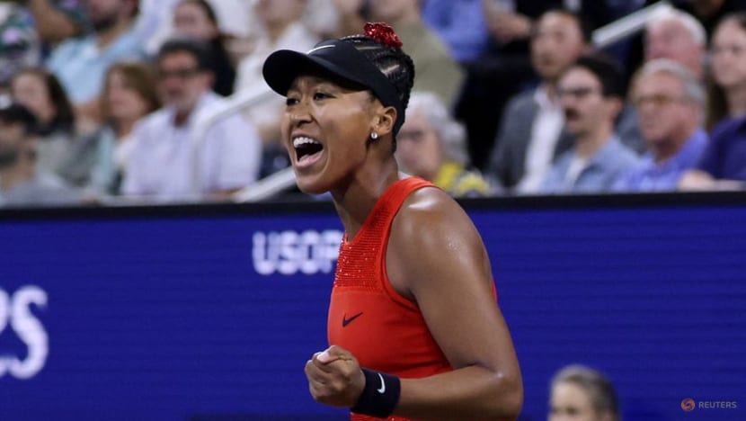 Resplendent in red, Osaka races into US Open second round
