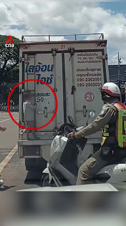 Boy clings to back of ice truck for over 10km in Thailand without driver noticing