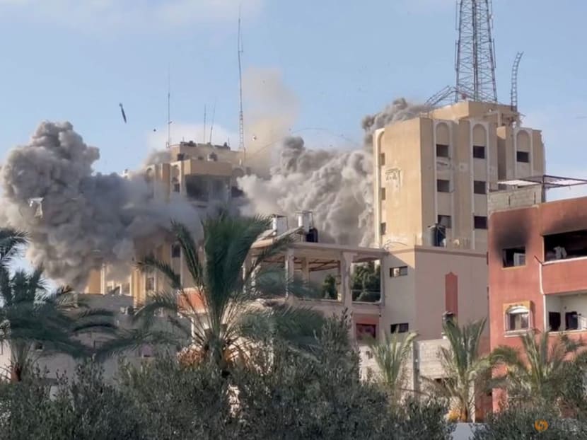 Smoke rises following an Israeli strike on a residential building, amid the ongoing conflict between Israel and Hamas, in Nuseirat in the central Gaza Strip, in this still picture taken from a video, July 24, 2024. Reuters TV via REUTERS Smoke rises following an Israeli strike on a residential building, amid the ongoing conflict between Israel and Hamas, in Nuseirat in the central Gaza Strip, in this still picture taken from a video, July 24, 2024. Reuters TV via REUTERS