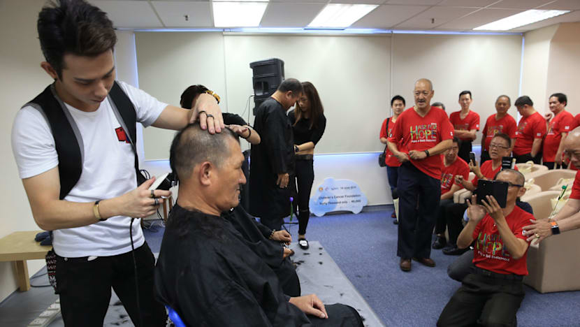 61 cabbies go bald in support for Hair for Hope