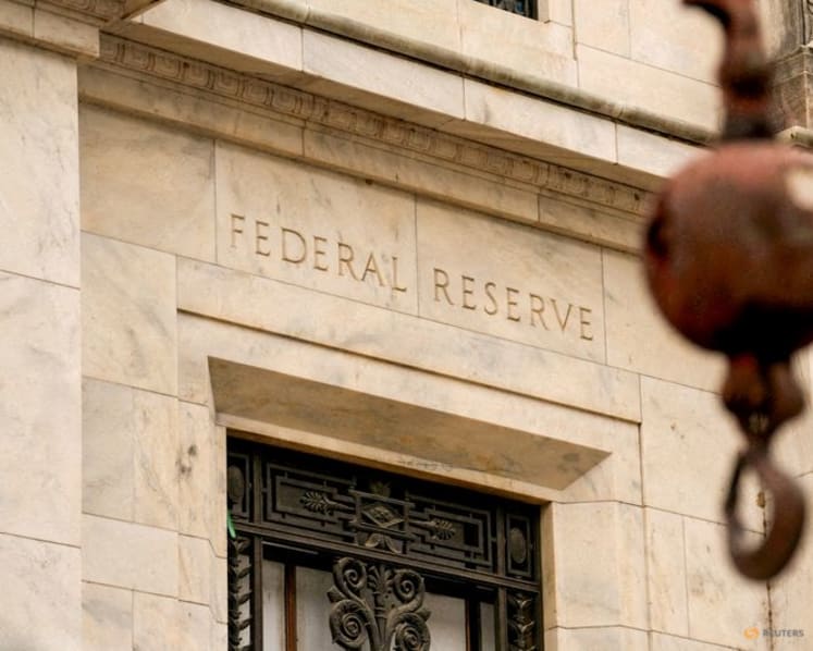 Stocks slump after Fed keeps rates unchanged as oil prices climb