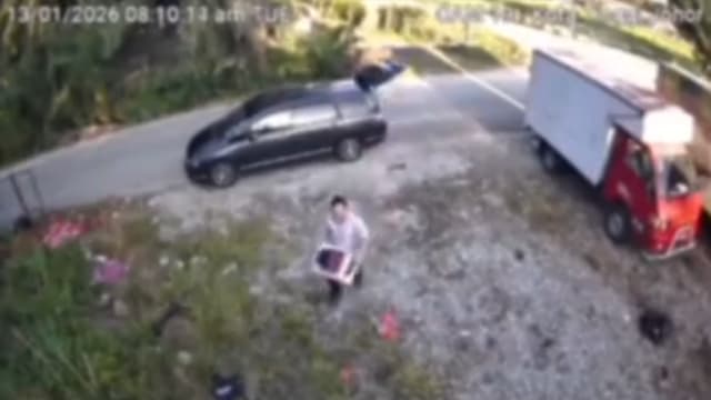 马国男子乱丢垃圾被电眼拍下 执法人员上门送罚单