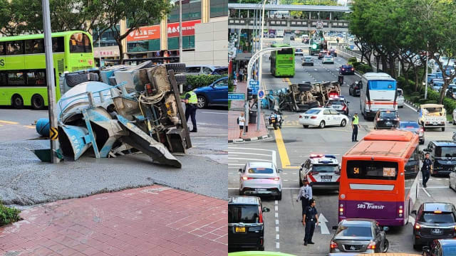 余东旋街水泥车侧翻撒一地 交通瘫痪两条道路封锁