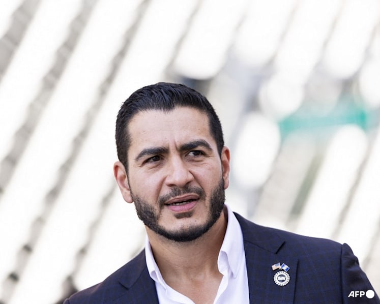 Leftist Democrat urges unity after victory in Michigan