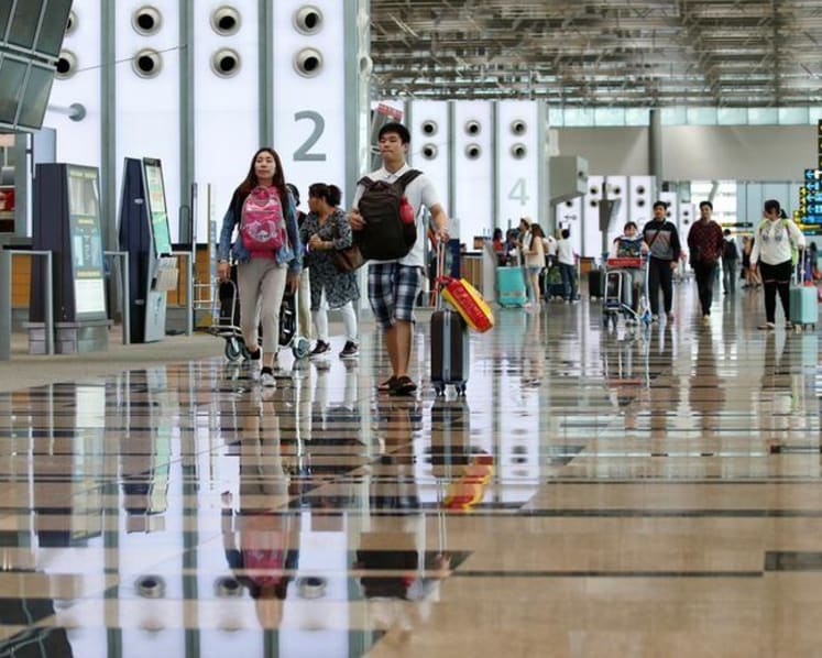 Singaporeans scramble to cancel trips, return home early after new travel restrictions announced