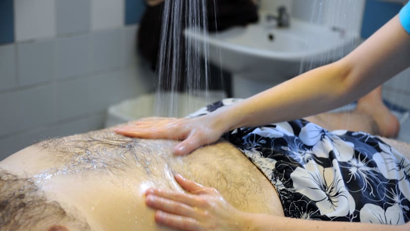 S$24,000 fine for recalcitrant TCM practitioner who ran unlicensed massage outlets