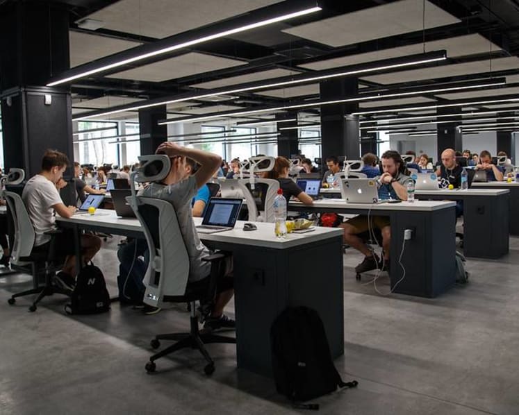 Commentary: Why are we all working so hard if it isn't making us richer?