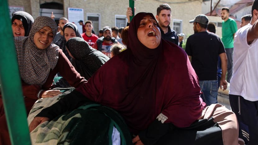 Gaza reports scores dead in Israeli strike on school, Israel says hit militants Gaza reports scores dead in Israeli strike on school, Israel says hit militants