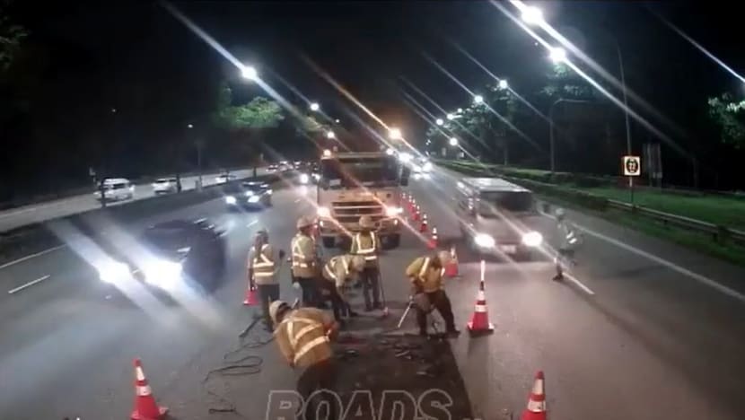 Road worker, 35, hit by lorry while dashing across PIE, taken conscious to hospital