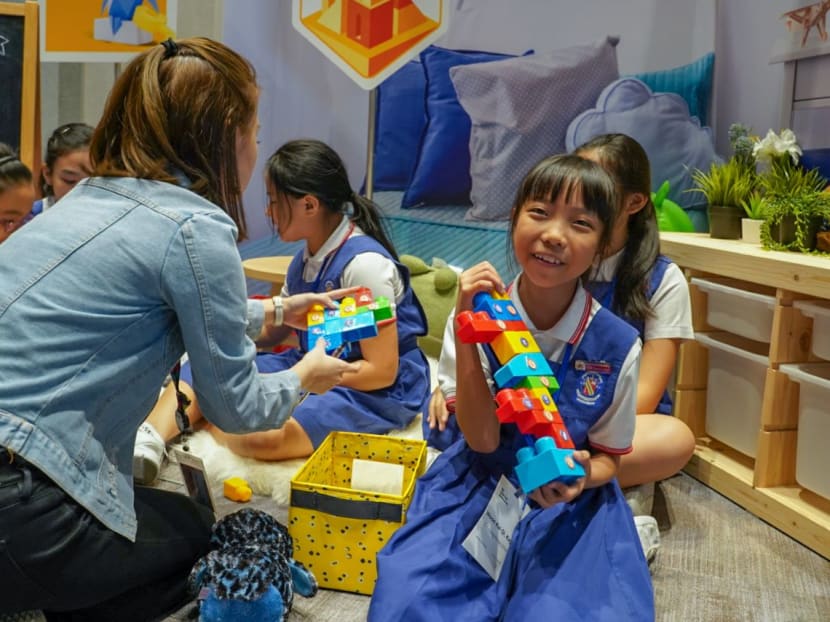 Students from CHIJ Katong Primary attempting one of the stations at the Google Online Safety Park.