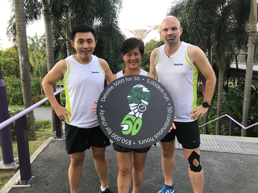 Deloitte Singapore Partners (L-R) Lee Boon Teck, Seah Gek Choo and James Walton will be leading Deloitte 5000 for 50, where Deloitte Partners, together with Deloitte employees, clients and community partners, run 5000km in 50 hours to raise funds for Metta Welfare Assocation's Arts@Metta Programme. Photo: Deloitte Singapore