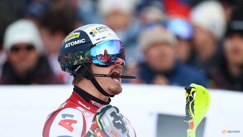 Alpine skiing-Feller a winner on home snow in Kitzbuehel slalom