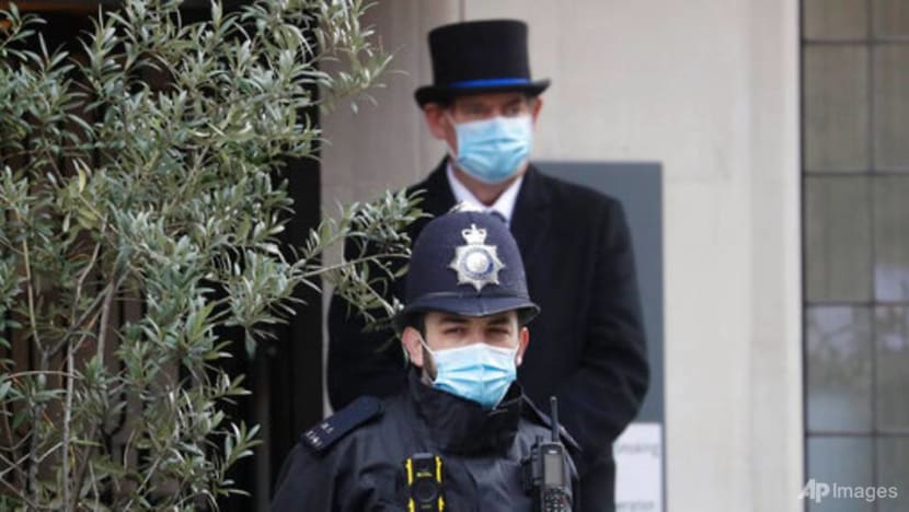 Britain's Prince Philip remains in hospital as 'precaution'
