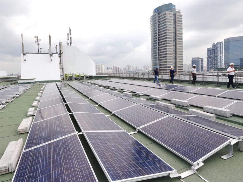 Solar panels on the top of JTC’s Jurong Town Hall building. The new model is aimed at encouraging more building owners to install such panels. Photo: Najeer Yusof