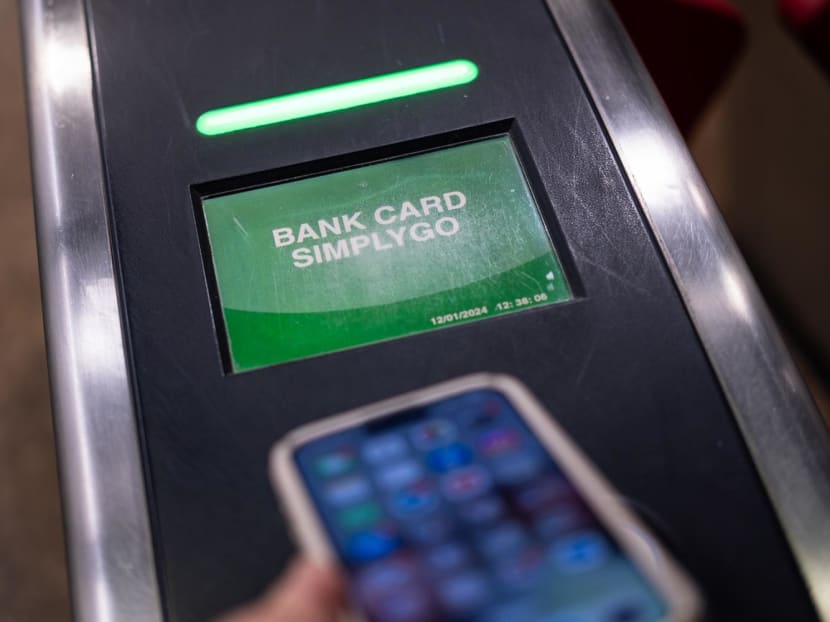 A screen display on an MRT fare gate as a bank card is used to tap in on Jan 12, 2024. 