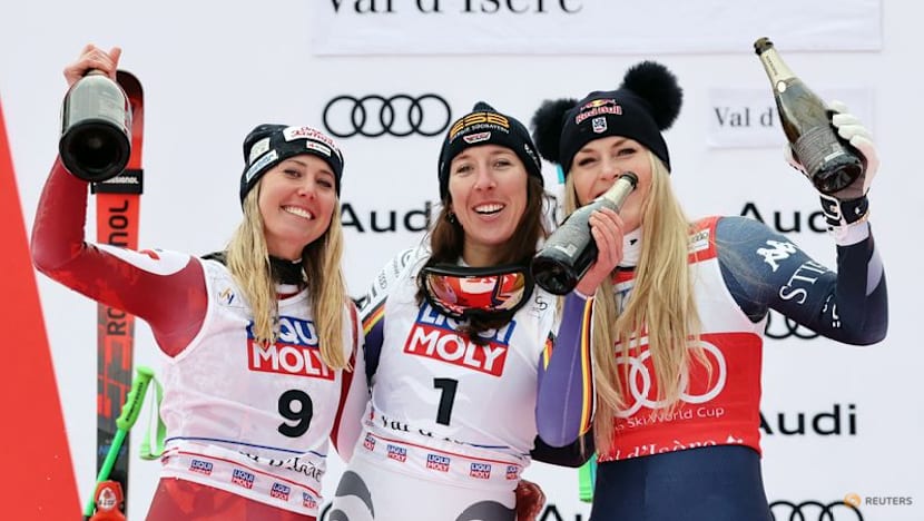 Alpine skiing-Huetter clinches first World Cup win of season, Vonn finishes third