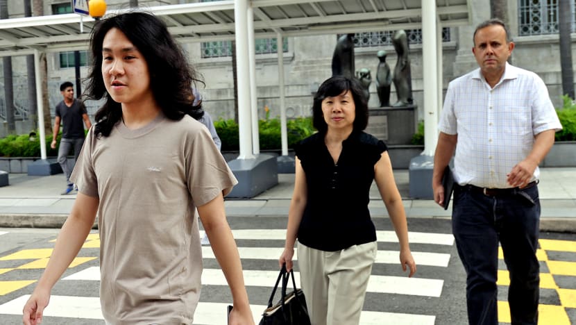 Amos Yee claims trial to 8 charges, bail extended