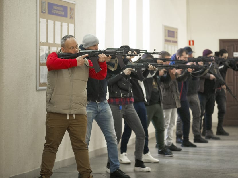 In Odessa, civilians come to train to hold a weapon, shoot, behave in a war zone or learn first aid to be ready for a Russian attack on March 26, 2022. In Odessa, civilians come to train to hold a weapon, shoot, behave in a war zone or learn first aid to be ready for a Russian attack on March 26, 2022.