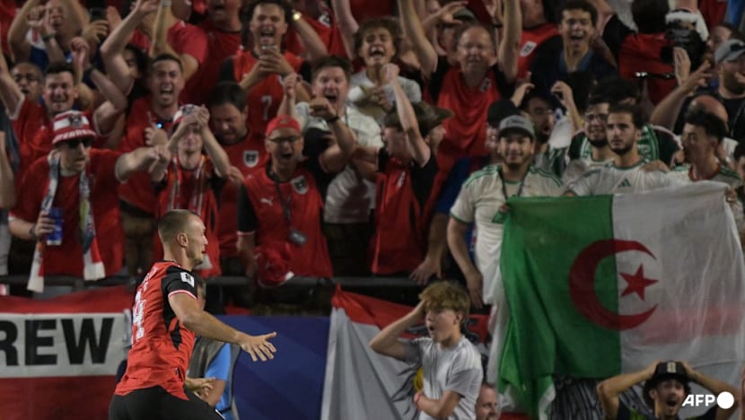 Austria draw with Algeria in World Cup thriller to progress and send Iran home