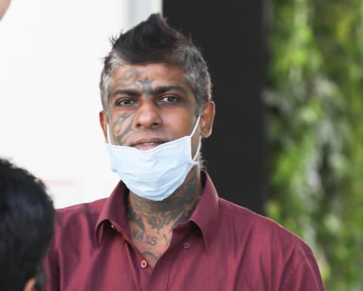 Man charged with saying he suspected he had coronavirus, coughing at another man in SingPost outlet