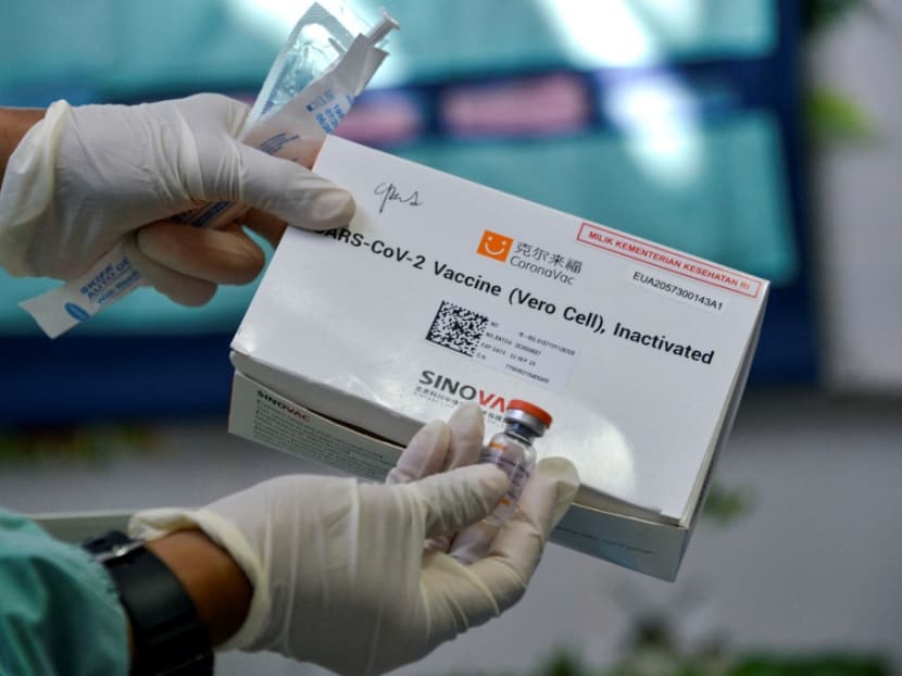 A health worker prepares to administer the Sinovac vaccine against the Sars-CoV-2 coronavirus at a community health centre in the Indonesian city of Banda Aceh. The vaccine has not yet been approved for use in Singapore. A health worker prepares to administer the Sinovac vaccine against the Sars-CoV-2 coronavirus at a community health centre in the Indonesian city of Banda Aceh. The vaccine has not yet been approved for use in Singapore.