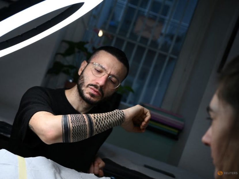 Palestinian keffiyeh scarves - a controversial symbol of solidarity