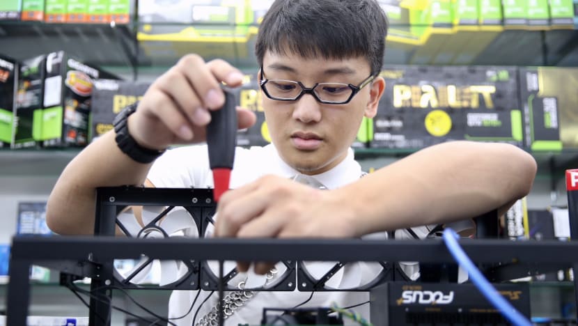ITE intern, a cryptocurrency ‘expert’, assembles mining rigs at retail shop