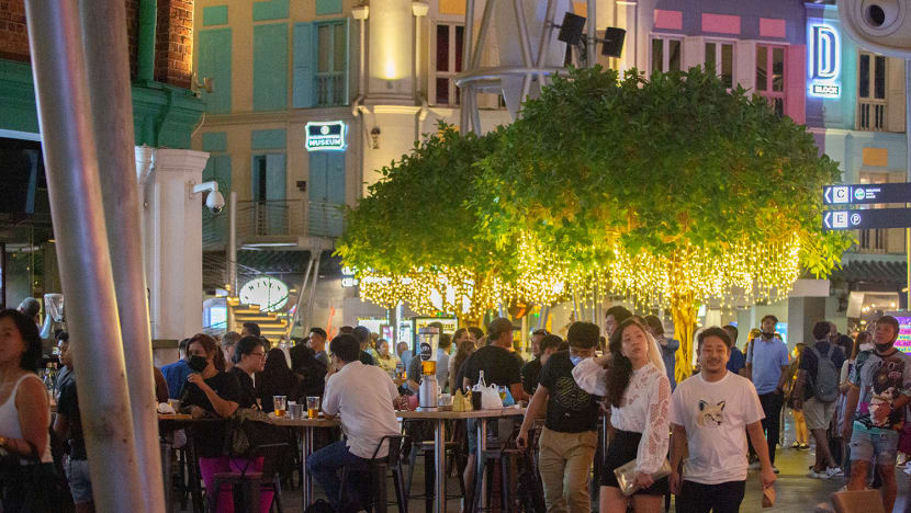 Groups of happy customers pack bars for late-night drinks on first day of relaxed Covid-19 rules 