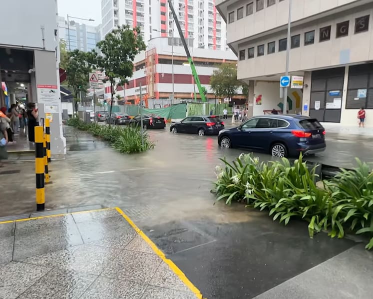 Heavy rain triggers flash flood near Bugis, warnings in several locations