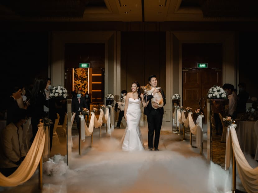 Mr Brandon Pang and Ms Vanetta Wong brought forward their wedding reception to May 7, 20201 after the authorities announced stricter Covid-19 restrictions. They initially planned to get hitched on May 9. Mr Brandon Pang and Ms Vanetta Wong brought forward their wedding reception to May 7, 20201 after the authorities announced stricter Covid-19 restrictions. They initially planned to get hitched on May 9.
