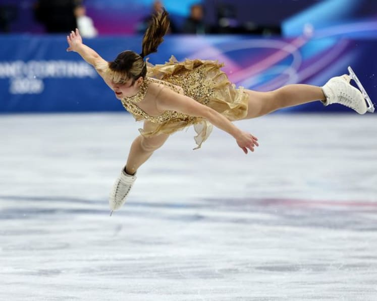 Figure skating-Dazzling Liu strikes gold to end US women's Olympic medal drought