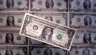 Dollar choppy as investors parse Fed outlook, await BoE decision 
