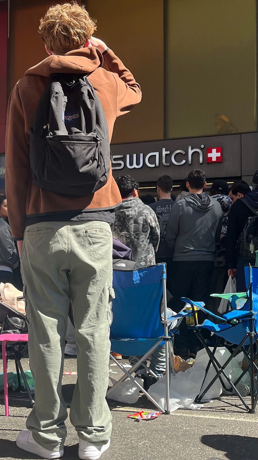 Shoving, tear gas, forced closures: Chaos at Swatch stores as brand launches collaboration with AP