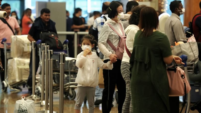 Employers must seek approval from MOM for work pass holders returning to Singapore after travel to China