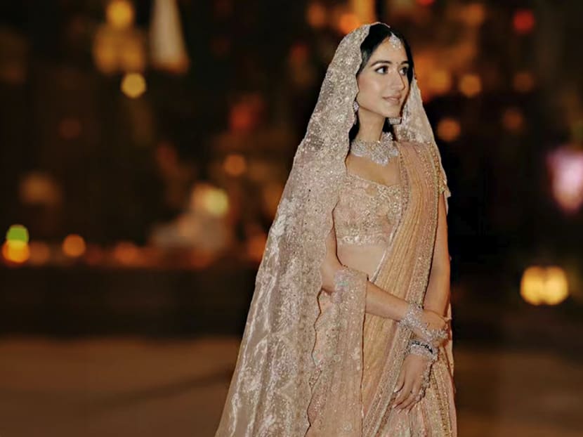 Indian billionaire heir's pre-wedding party: All the outfits worn by bride-to-be Radhika Merchant 
