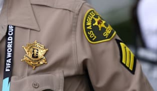 Police, firefighters proudly wear World Cup badges as they provide security