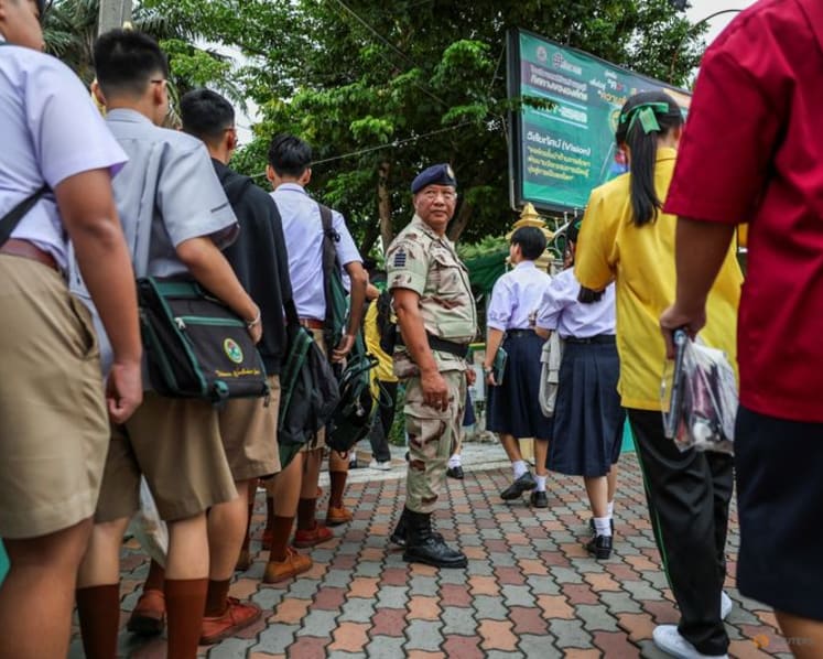 After student's shooting rampage, Thai school reopens under tight security 