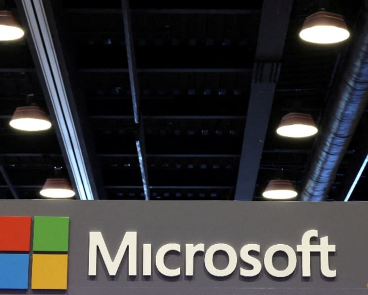 Ackman's Pershing Square takes Microsoft stake, exits Google parent Alphabet