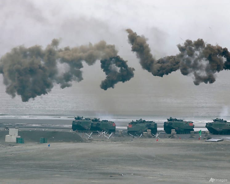 China says US military aid to Taiwan will not deter its will to unify the island
