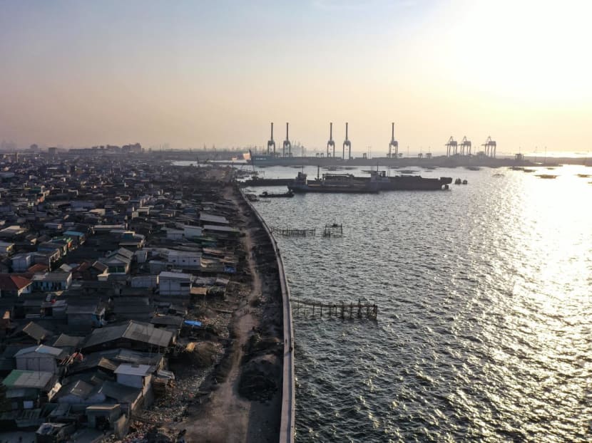 A sea wall dividing houses and the waters along the North Jakarta coast. A fishing boat that departed from a North Jakarta port on March 3, 2024, capsized on March 9, leaving two dead and at least 22 missing. A sea wall dividing houses and the waters along the North Jakarta coast. A fishing boat that departed from a North Jakarta port on March 3, 2024, capsized on March 9, leaving two dead and at least 22 missing.