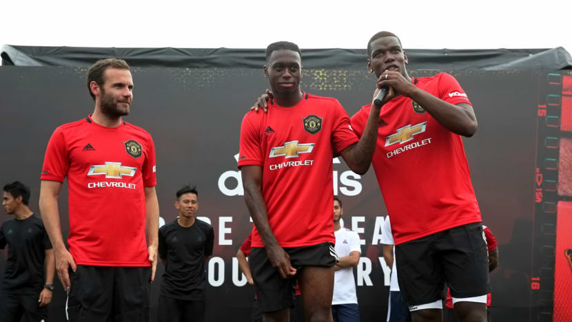 Floating platform becomes sea of red as Manchester United fans see stars