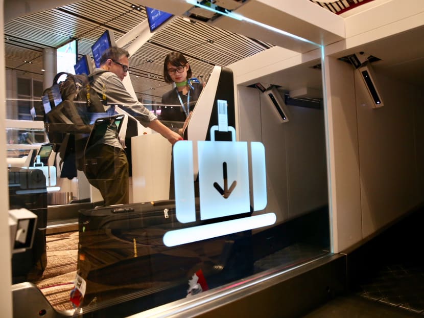 A passenger checking in his luggage at Changi Airport Terminal 4. Flights and accommodation in the Asia-Pacific may cost less if booked on certain days, according to a 2019 pricing outlook report by travel companies Expedia Group and Airline Reporting Corporation.