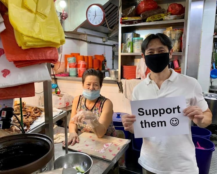 MP Louis Ng will not face charges for holding placard without permit in support of hawkers: AGC