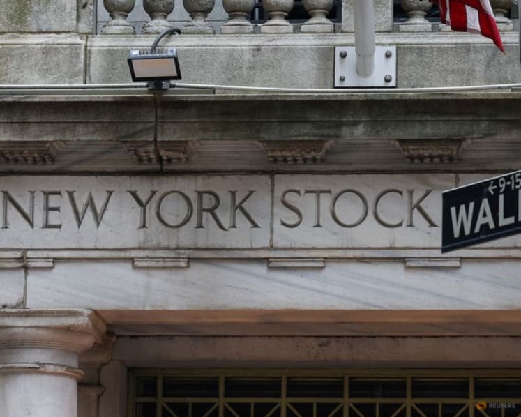 Wall Street indexes end higher ahead of Fed meeting; Tesla and Alphabet rally