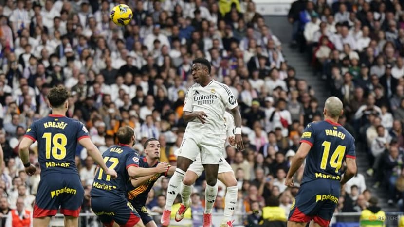 Real beat Girona 2-0 to move level on points with leaders Barcelona