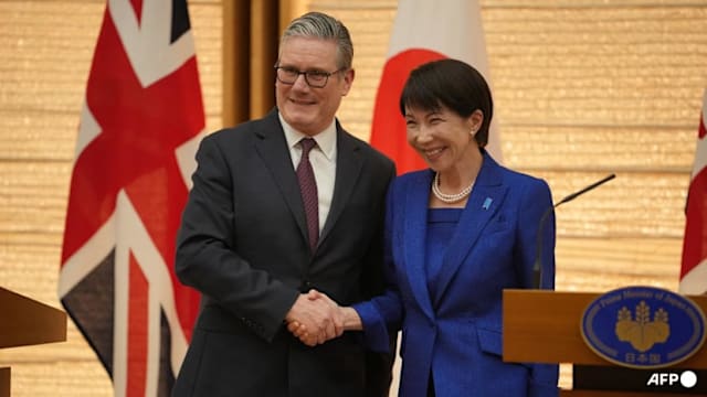 英日首相会谈 同意加强国防与经济合作