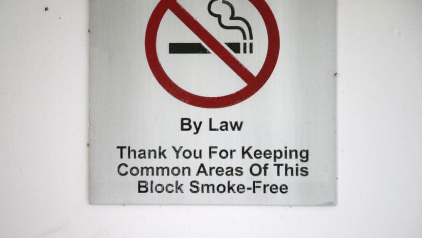 Jail for man who offered officers S$12 bribe after being caught smoking at void deck