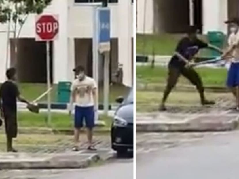 Neo Hong Wei, armed with a kitchen knife (right in photos), is confronted by an off-duty police officer who was carrying a hoe that he had borrowed from a nearby construction site.